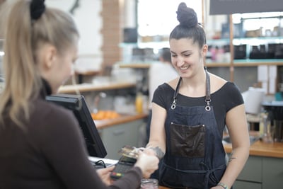 A Lady Shopping at Store with Middlesex Federal Debit Card